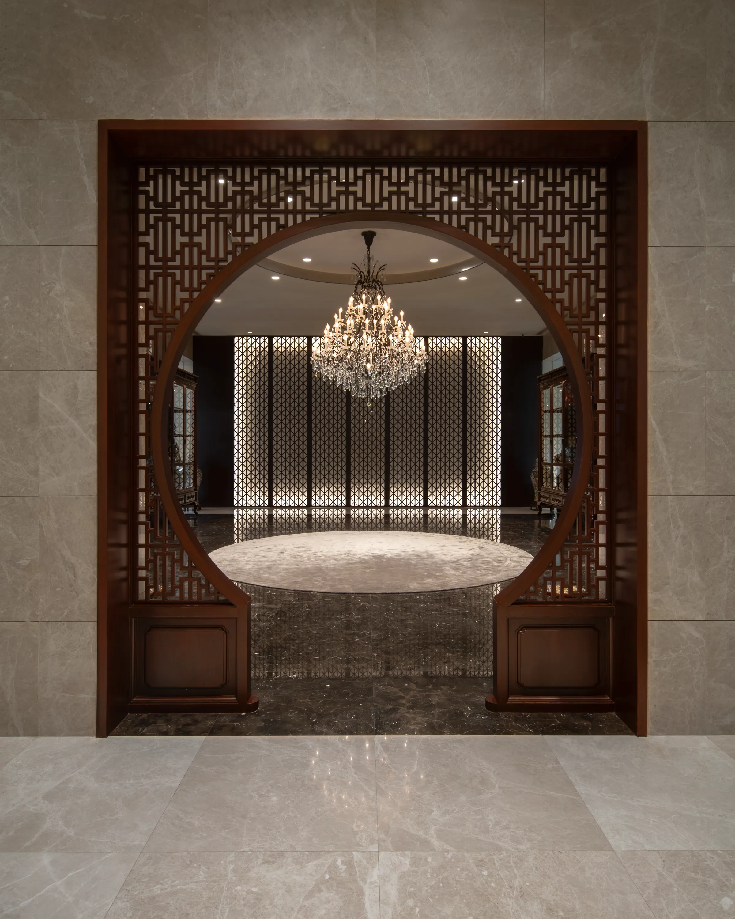 Wider view of the wooden entry doorway at Khon Kaen Residence.