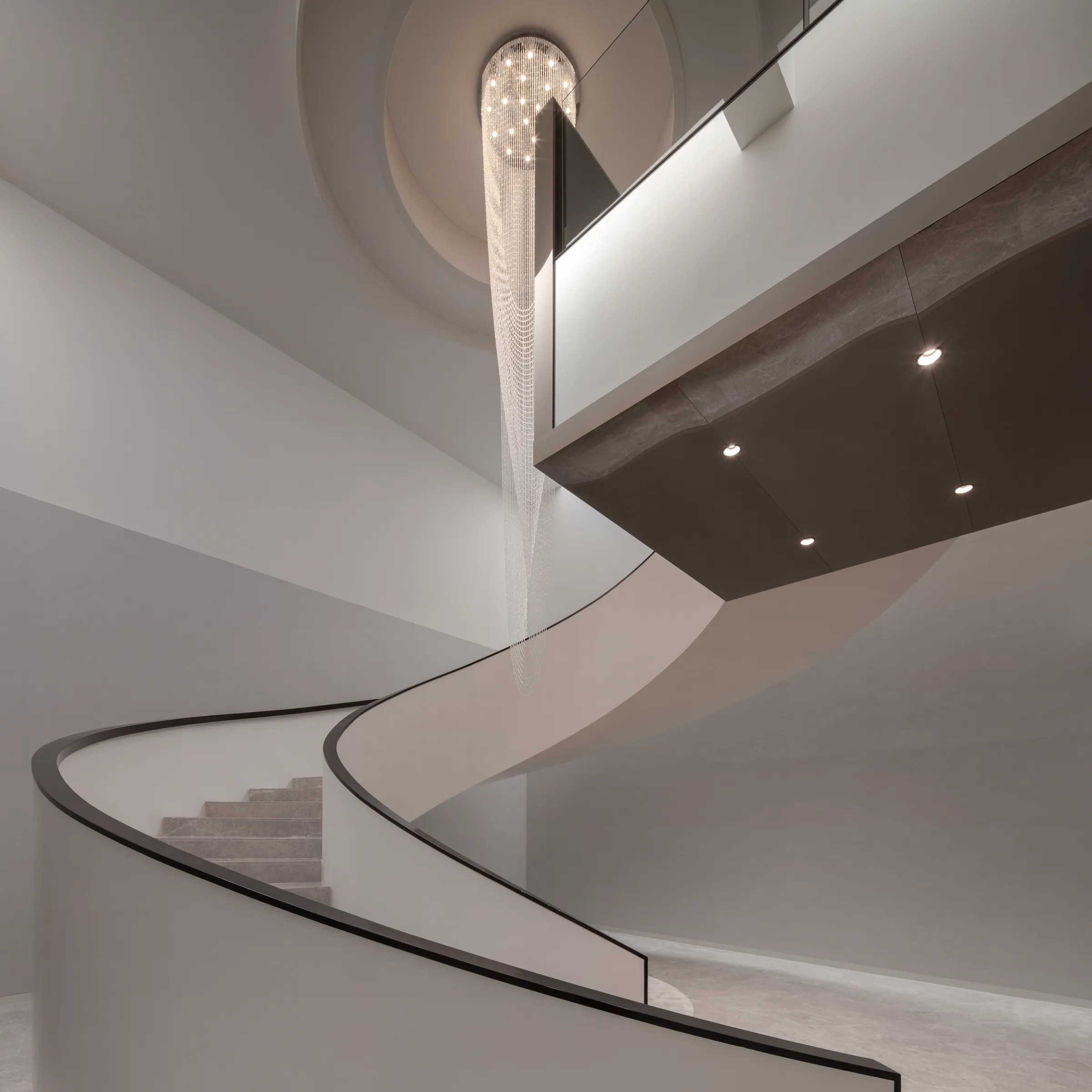 Light column at the top of the spiral staircase, glowing pale cream.