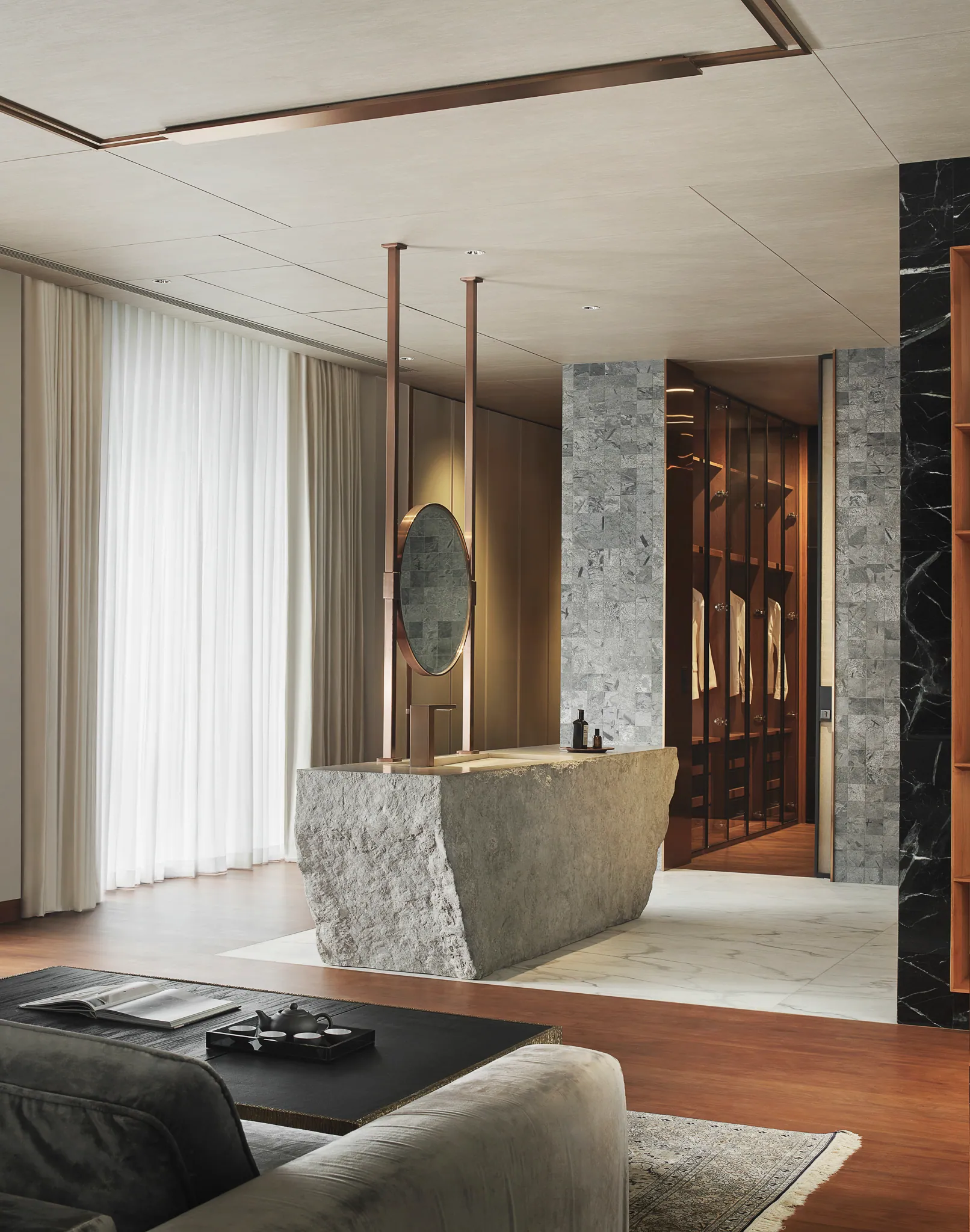 Master bedroom — warm marble bathing area.