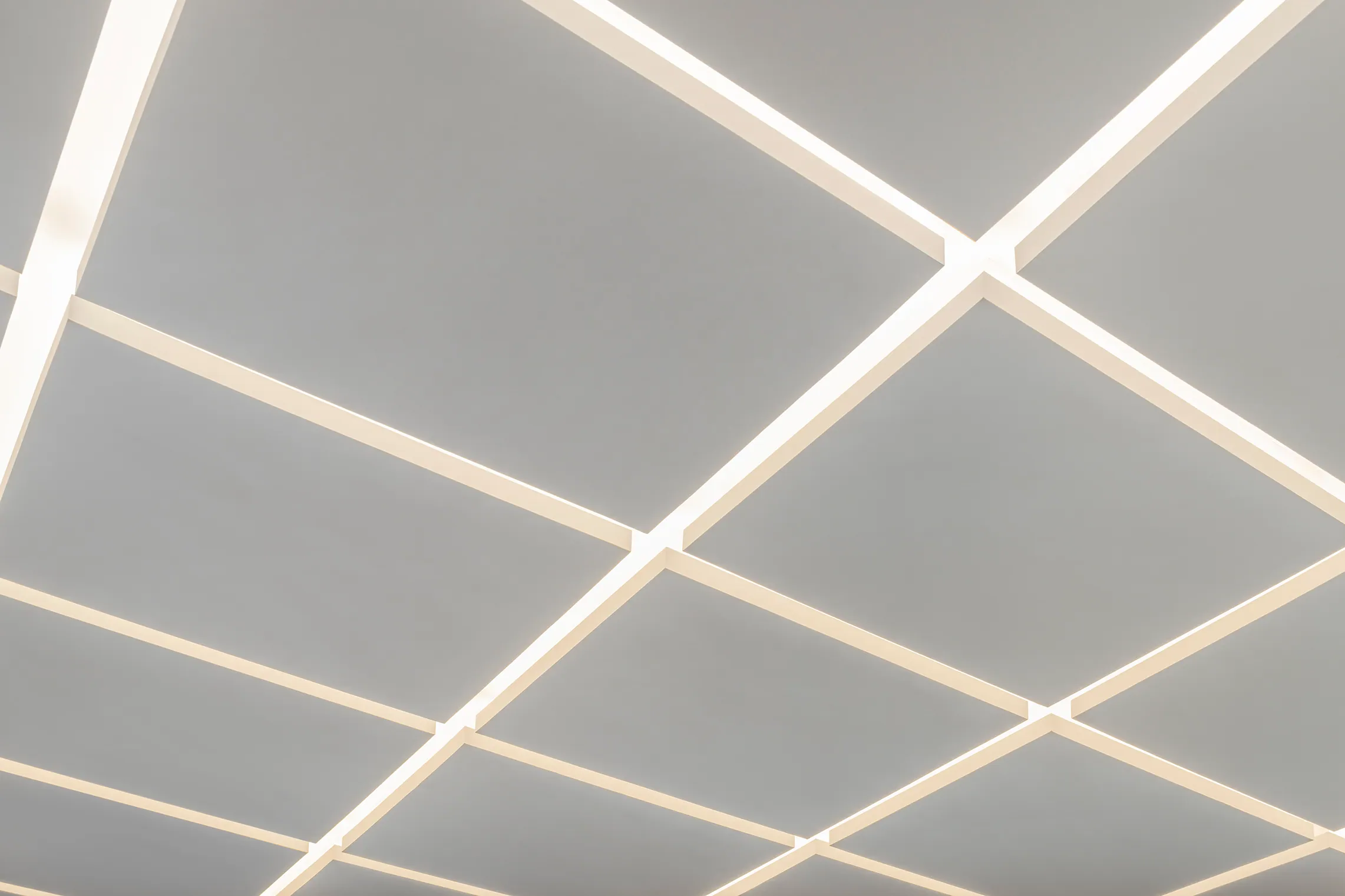 Fitness ceiling close-up at Water House — pristine geometric soffit pattern.